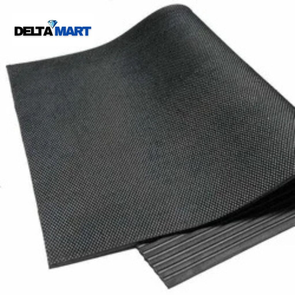 Black ribbed livestock flooring rubber mat with a smooth textured top, suited to lambing sheds and calf pens